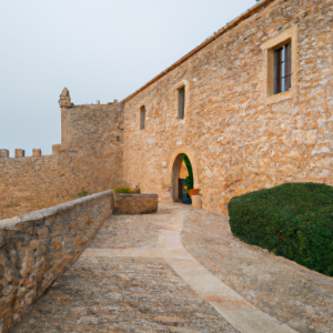 Altafulla Castle is a medieval fortress overlooking the sea, showcasing a blend of history and architecture. Visitors can explore its ancient walls and gardens.
