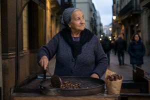 Castanyera torrant castanyes al seu carrer de Barcelona per la Castanyada, el dia de Tots Sants